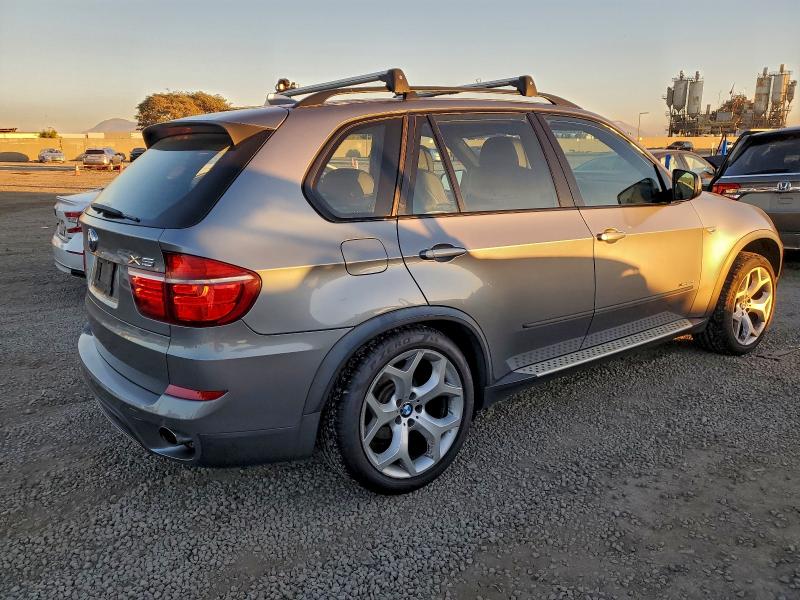 Photo 3 from auction – 2011 BMW 5 SERIES with VIN 5UXZW0C56BL370155