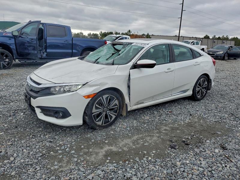 HONDA CIVIC EX 2016 with VIN 19XFC1F32GE017358 - Photo from auction