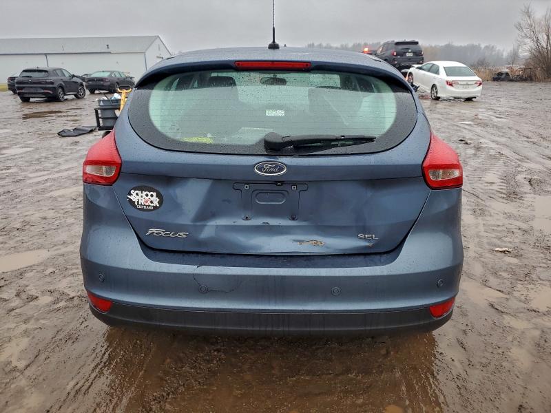 Photo 6 from auction – 2018 FORD FOCUS SEL with VIN 1FADP3M28JL301065
