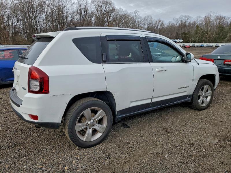 Photo 3 from auction – 2014 JEEP COMPASS LA with VIN 1C4NJCEA0ED518261