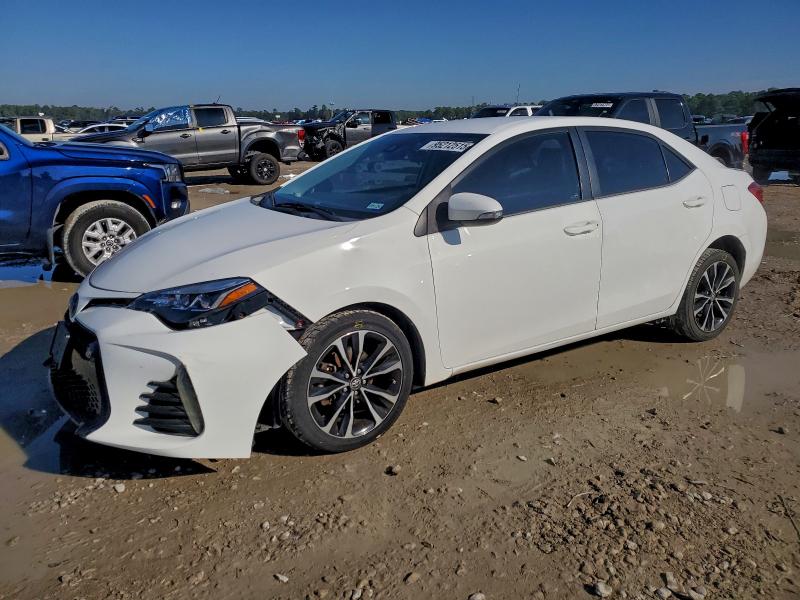 TOYOTA COROLLA L 2017 with VIN 5YFBURHE6HP702584 - Photo from auction