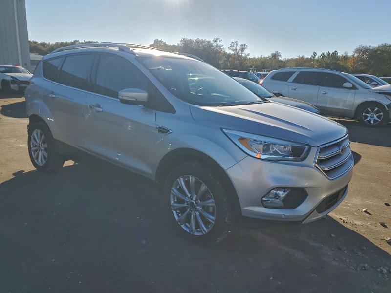 Photo 4 from auction – 2018 FORD ESCAPE TIT with VIN 1FMCU9J96JUA67226