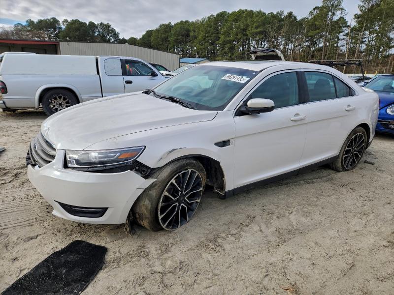 FORD TAURUS SEL 2017 with VIN 1FAHP2H89HG144370 - Photo from auction