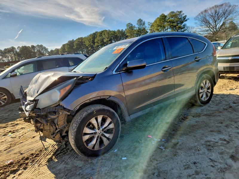 HONDA CR-V EXL 2014 with VIN 2HKRM4H75EH620504 - Photo from auction