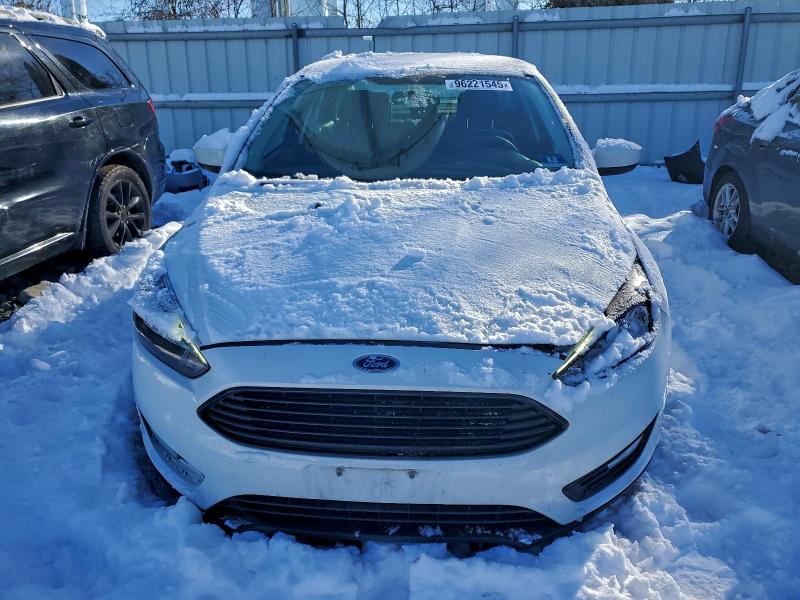 Photo 5 from auction – 2018 FORD FOCUS SE with VIN 1FADP3FEXJL232077