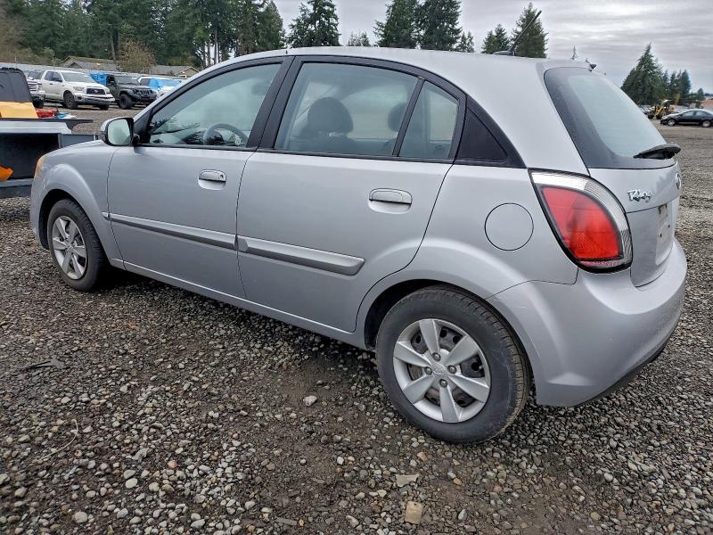 Photo 2 from auction – 2011 KIA RIO BASE with VIN KNADH5A34B6755326