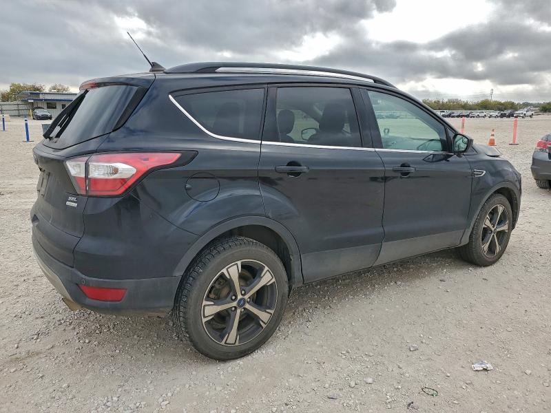 Photo 3 from auction – 2018 FORD ESCAPE SEL with VIN 1FMCU0HD3JUD20461