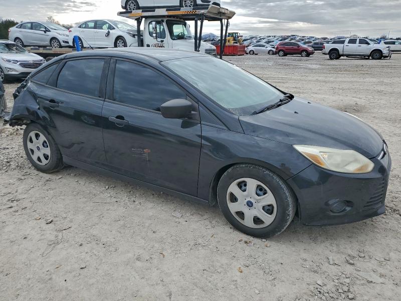 Photo 4 from auction – 2014 FORD FOCUS S with VIN 1FADP3E23EL203436
