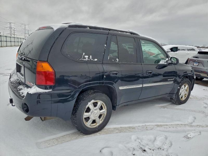 Photo 3 from auction – 2006 GMC ENVOY with VIN 1GKDS13S062235109