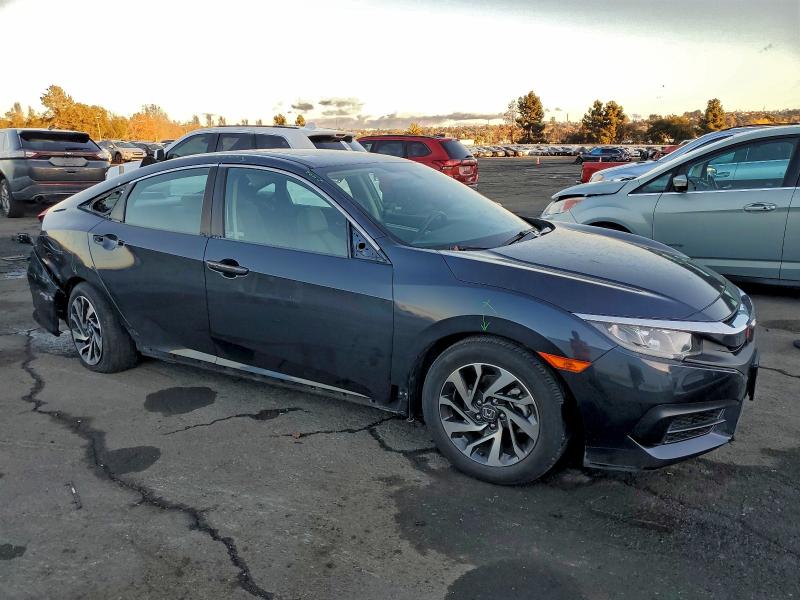 Photo 4 from auction – 2018 HONDA CIVIC EX with VIN 2HGFC2F71JH524256