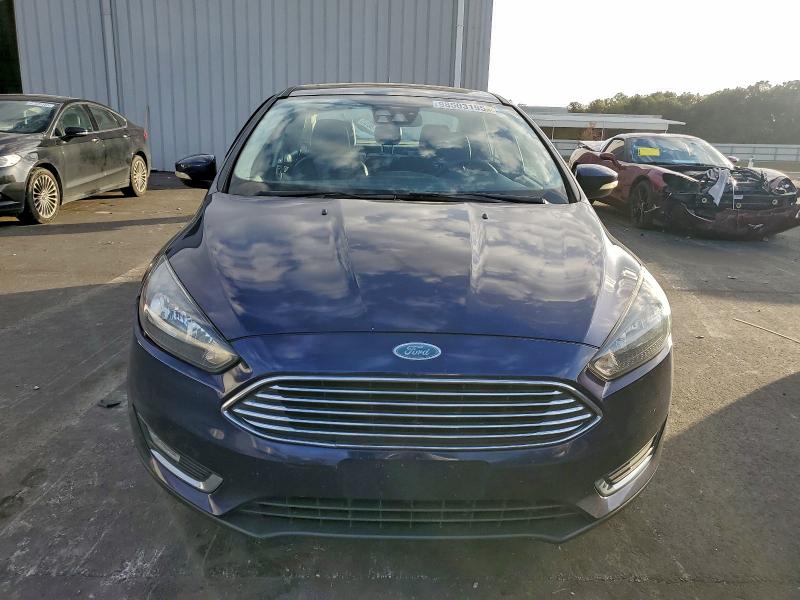 Photo 5 from auction – 2017 FORD FOCUS with VIN 1FADP3J20HL235075