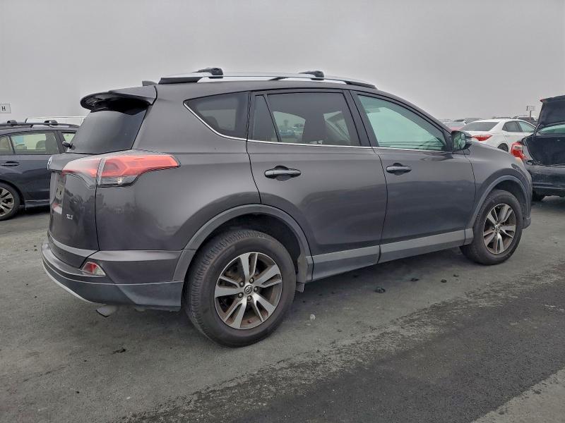 Photo 3 from auction – 2016 TOYOTA RAV4 XLE with VIN 2T3WFREV6GW309110