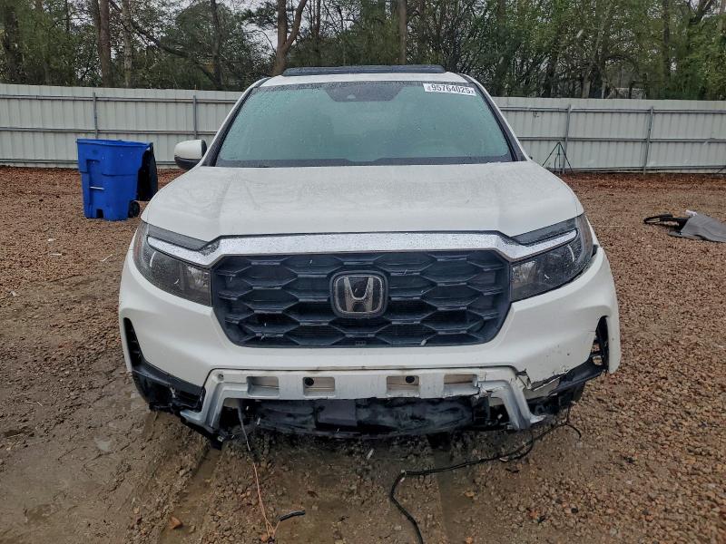 Photo 5 from auction – 2022 HONDA PASSPORT with VIN 5FNYF7H56NB000832