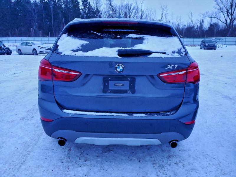 Photo 6 from auction – 2016 BMW X1 with VIN WBXHT3Z35G4A50359
