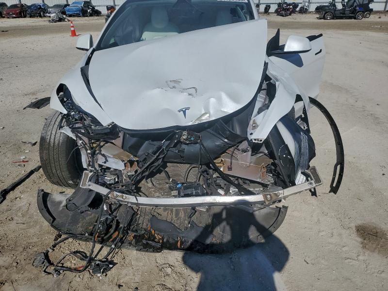 Photo 12 from auction – 2022 TESLA MODEL Y with VIN 7SAYGDEE3NF537838