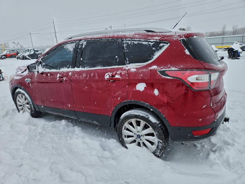 Photo 2 from auction – 2017 FORD ESCAPE TIT with VIN 1FMCU9J98HUA81574