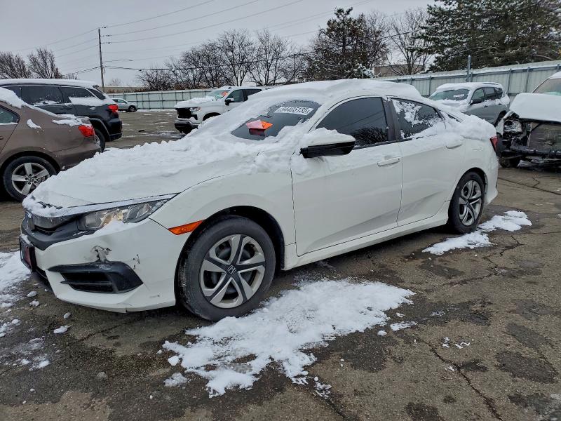 HONDA CIVIC LX 2018 with VIN 19XFC2F52JE024809 - Photo from auction