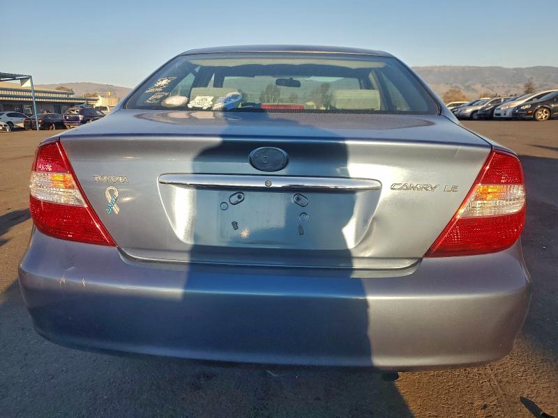 Photo 6 from auction – 2002 TOYOTA CAMRY with VIN JTDBE32K120083046