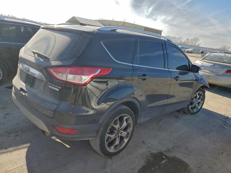 Foto 3 de la subasta – 2014 FORD ESCAPE TIT con VIN 1FMCU0J97EUA35077