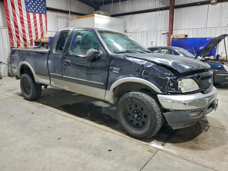 Photo 4 from auction – 2000 FORD F150 with VIN 1FTRX18L6YNB87279