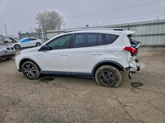 Photo 2 from auction – 2018 TOYOTA RAV4 LE with VIN JTMZFREV5JJ200432
