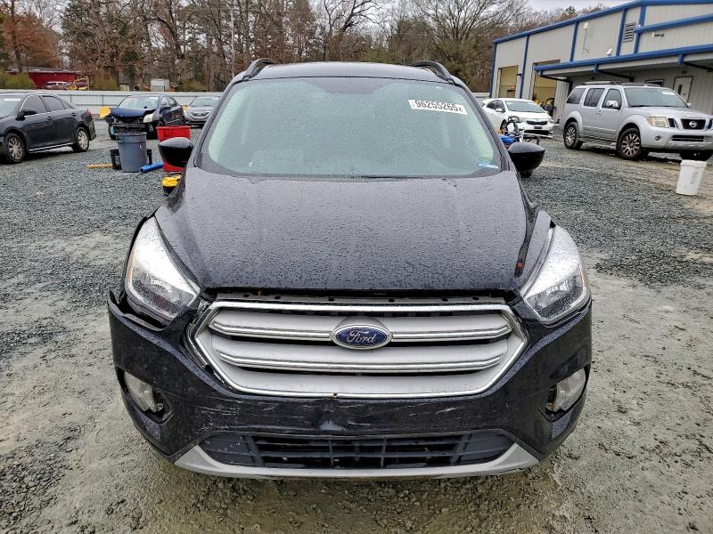 Photo 5 from auction – 2018 FORD ESCAPE SE with VIN 1FMCU0GD4JUB59829