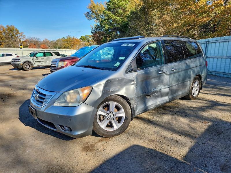 HONDA ODYSSEY TO 2010 with VIN 5FNRL3H93AB096969 - Photo from auction