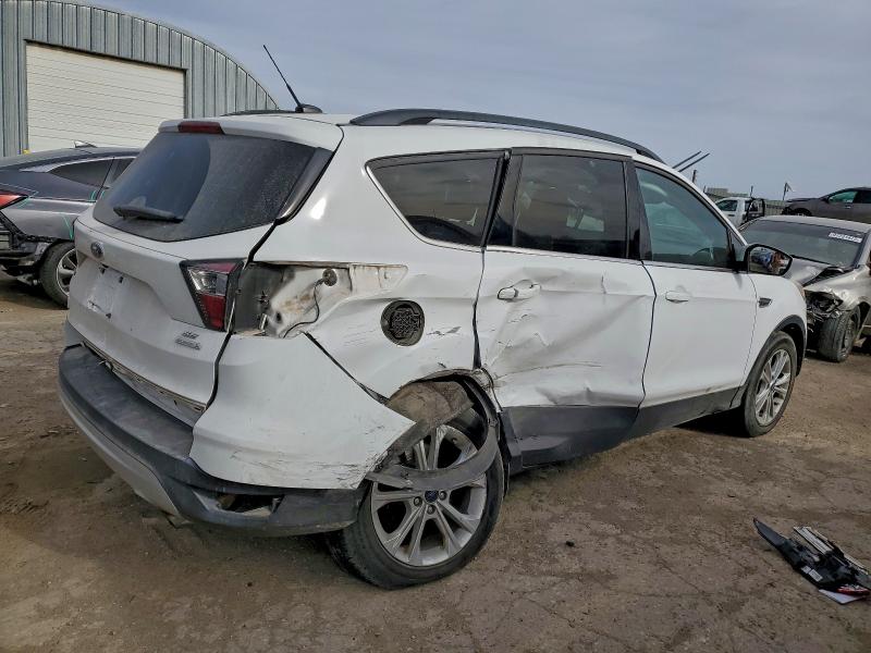 Photo 3 from auction – 2018 FORD ESCAPE with VIN 1FMCU0GD3JUD06786
