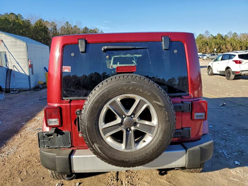 Photo 6 from auction – 2011 JEEP WRANGLER U with VIN 1J4HA5H18BL553727