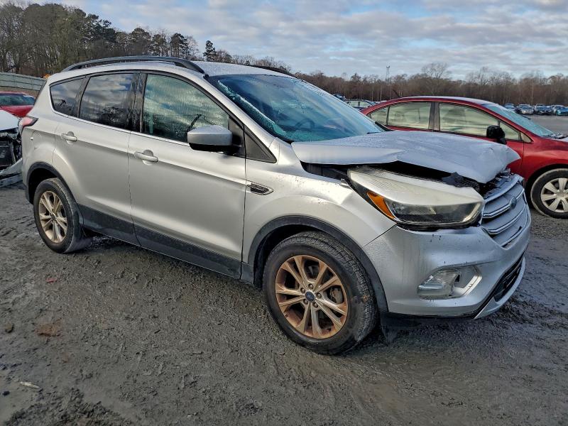 Photo 4 from auction – 2018 FORD ESCAPE SE with VIN 1FMCU0GD5JUA43426