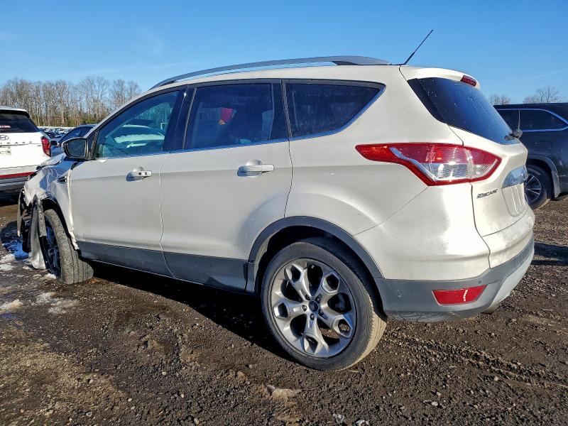 Photo 2 from auction – 2014 FORD ESCAPE TIT with VIN 1FMCU0J93EUA90111