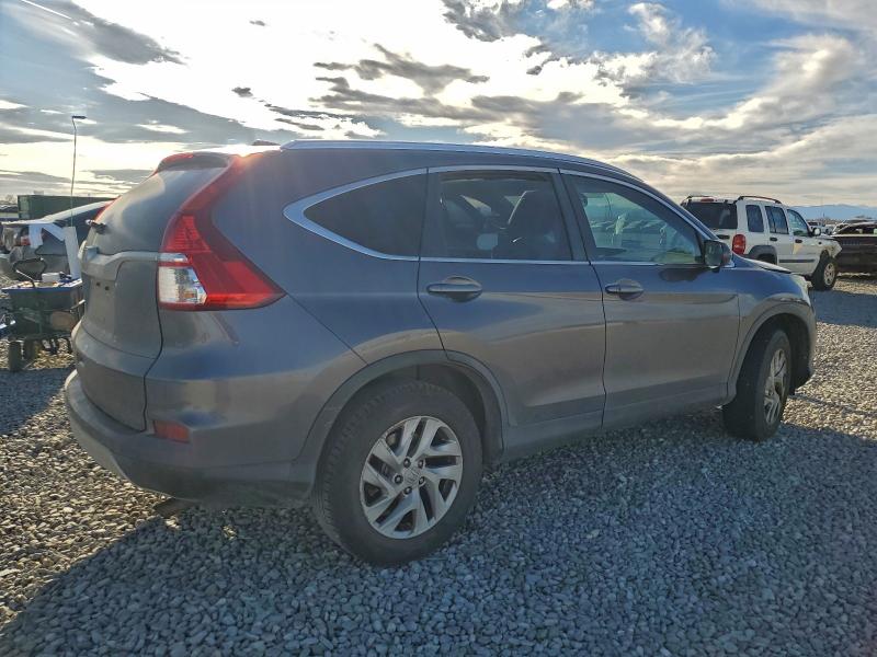 Photo 3 from auction – 2015 HONDA CR-V EXL with VIN 2HKRM4H76FH637569