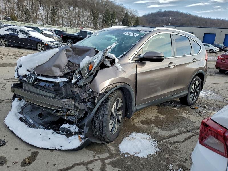 Photo 1 from auction – 2016 HONDA CR-V TOURI with VIN 5J6RM4H94GL098104
