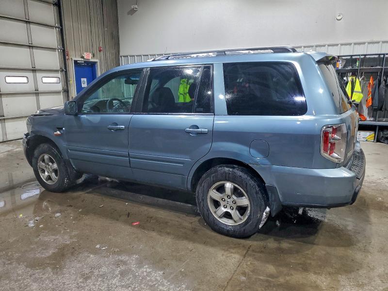 Photo 2 from auction – 2006 HONDA PILOT EX with VIN 2HKYF18566H561533