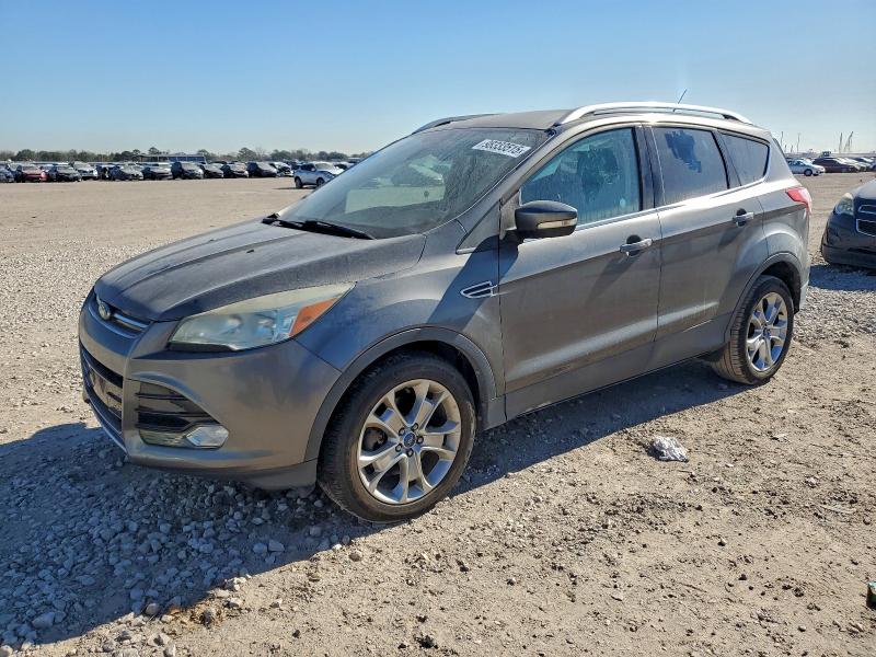 FORD ESCAPE TIT 2014 with VIN 1FMCU0J94EUA47509 - Photo from auction