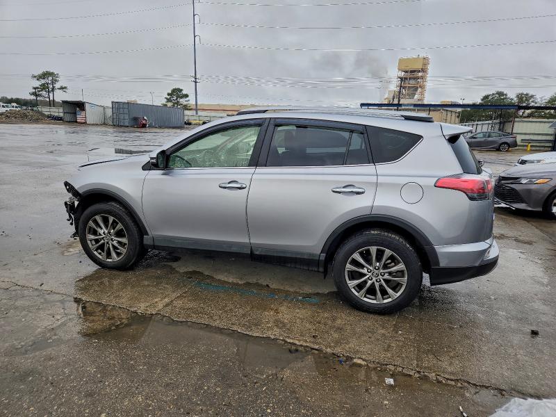 Photo 2 from auction – 2018 TOYOTA RAV4 LIMIT with VIN JTMYFREV1JD120877