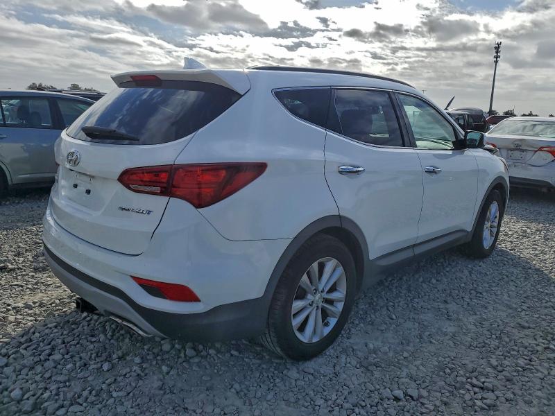 Photo 3 from auction – 2018 HYUNDAI SANTA FE S with VIN 5NMZU4LA5JH094692