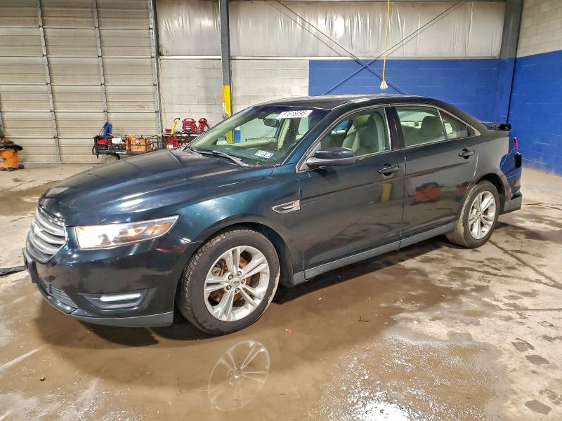 FORD TAURUS 2014 with VIN 1FAHP2H83EG174976 - Photo from auction