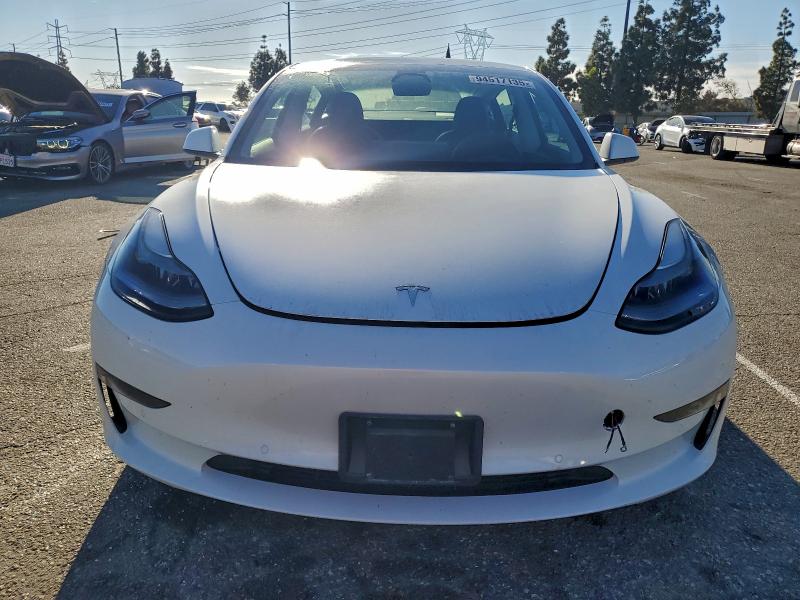 Photo 5 from auction – 2021 TESLA MODEL 3 with VIN 5YJ3E1EA5MF976207