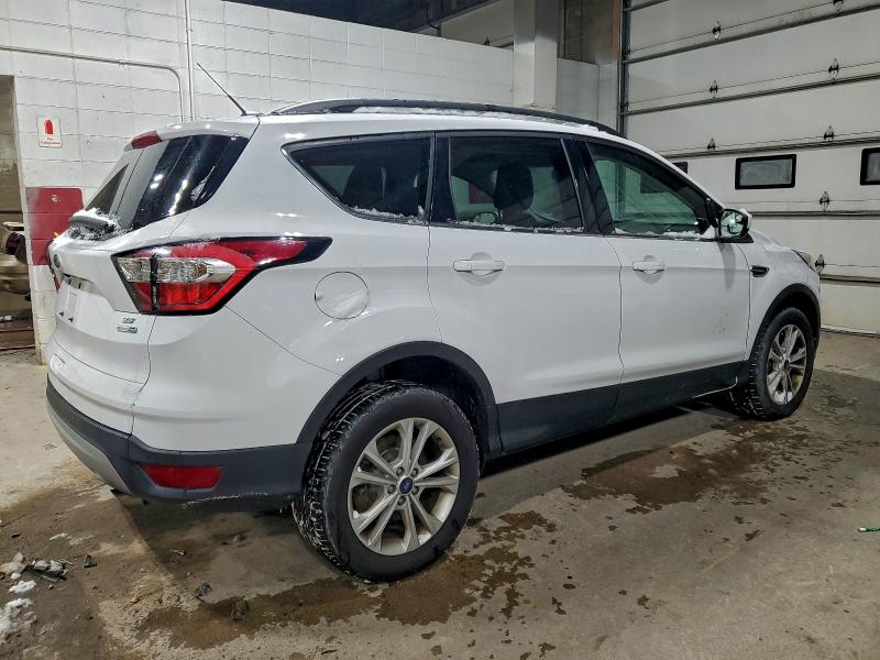Photo 3 from auction – 2018 FORD ESCAPE SE with VIN 1FMCU9GD0JUD07236
