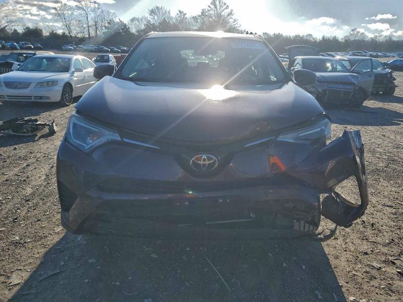 Photo 5 from auction – 2018 TOYOTA RAV4 LE with VIN 2T3ZFREVXJW450136