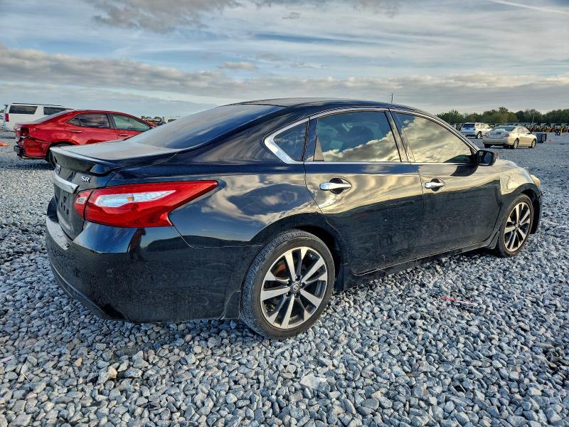 Photo 3 from auction – 2016 NISSAN ALTIMA 2.5 with VIN 1N4AL3AP2GC214852