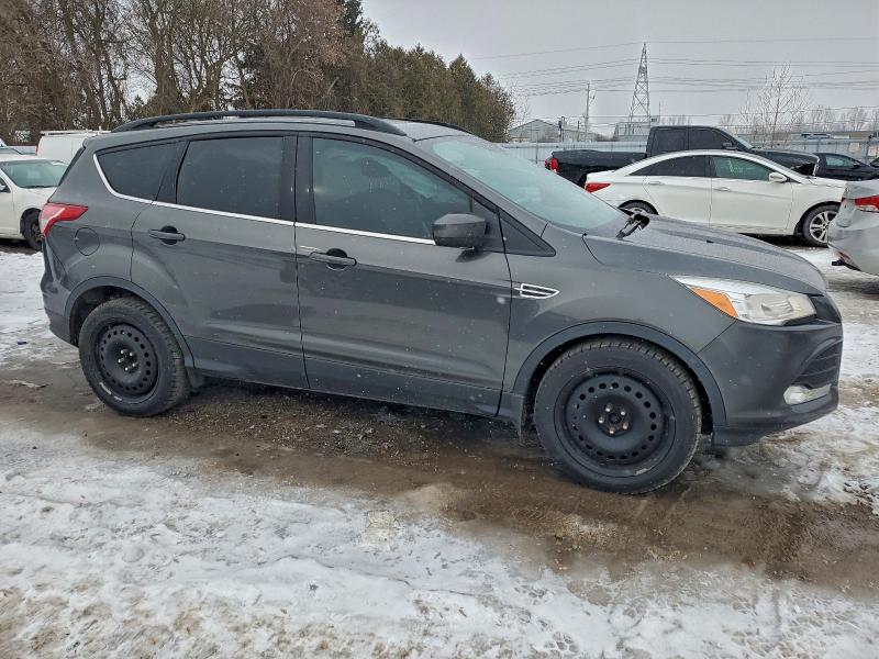 Photo 4 from auction – 2015 FORD ESCAPE SE with VIN 1FMCU0GX7FUC38655