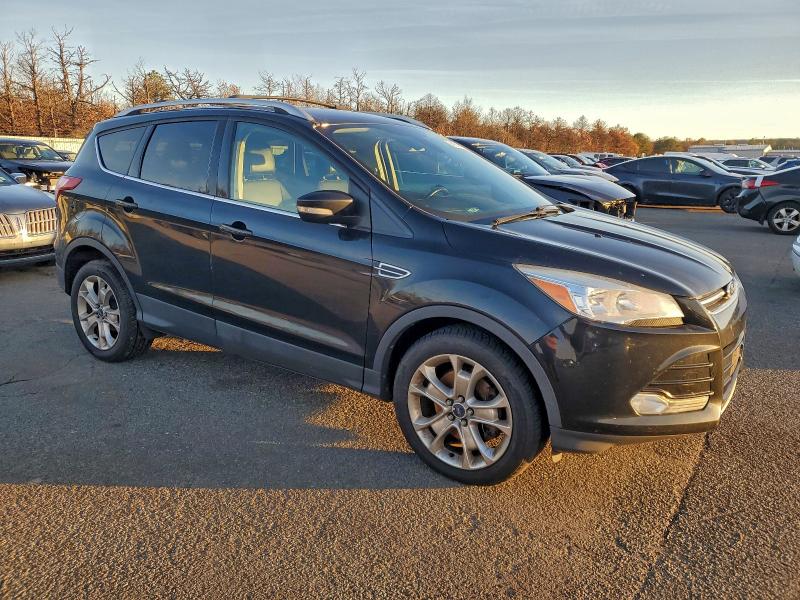 Photo 4 from auction – 2014 FORD ESCAPE TIT with VIN 1FMCU9J93EUC77692