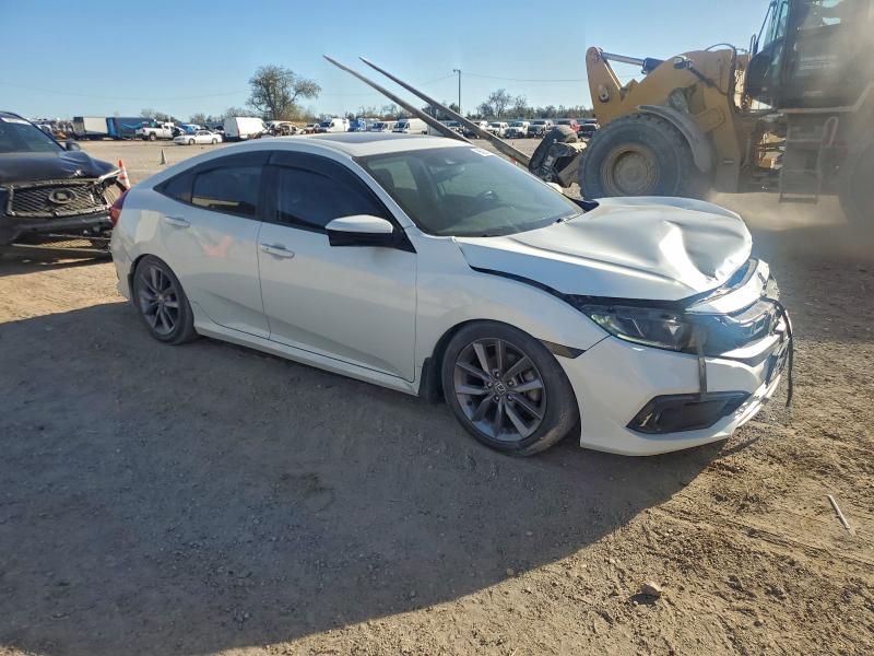 Photo 4 from auction – 2020 HONDA CIVIC EX with VIN 19XFC1F35LE019356