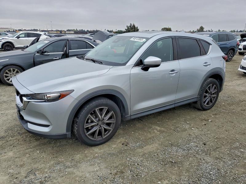 MAZDA CX-5 TOURI 2018 with VIN JM3KFACM8J0303385 - Photo from auction
