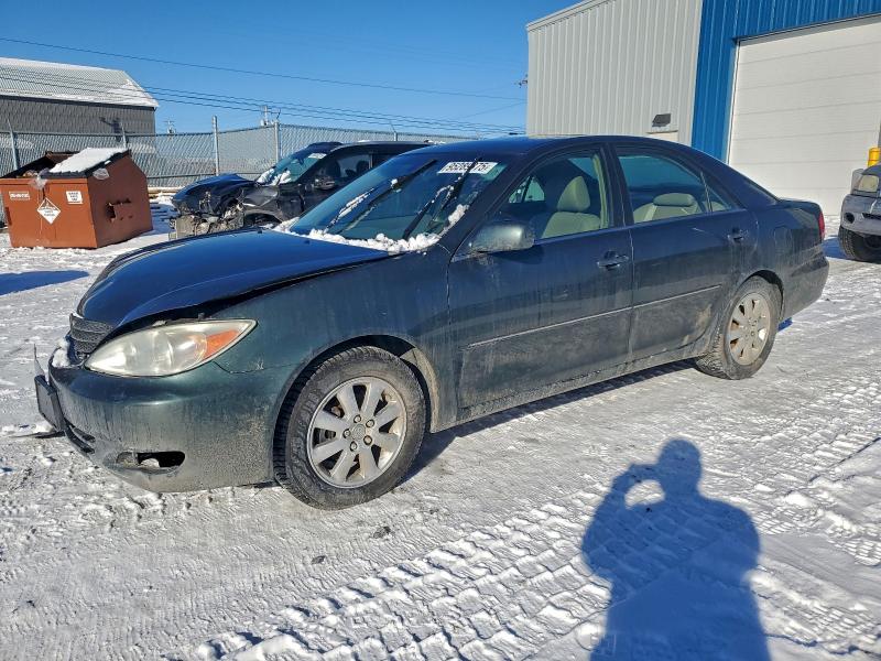 TOYOTA CAMRY 2002 with VIN JTDBE30K220069966 - Photo from auction