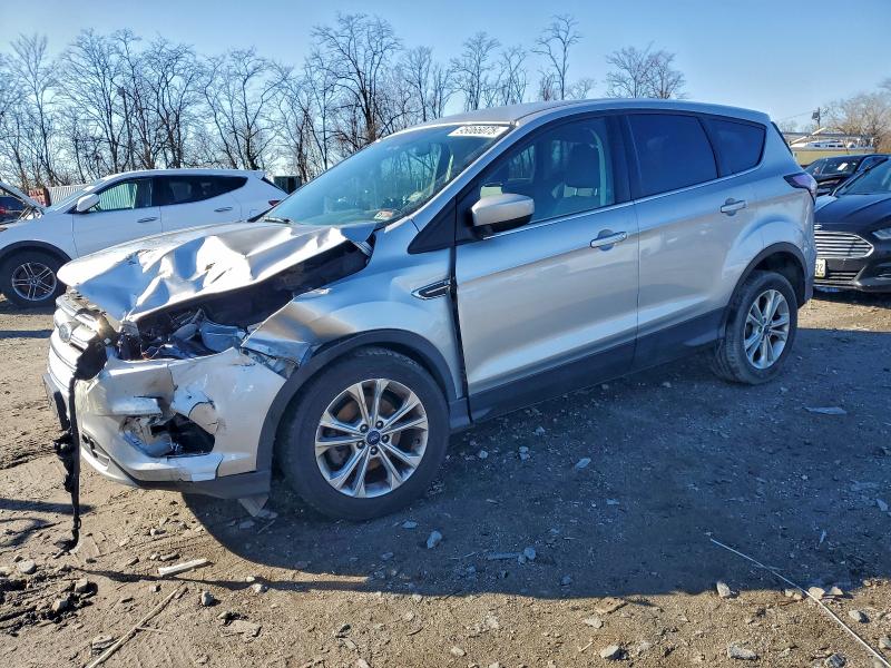 FORD ESCAPE 2017 with VIN 1FMCU0GD0HUE98453 - Photo from auction