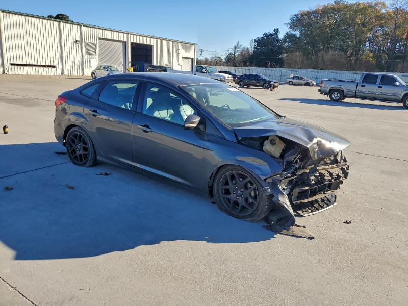 Photo 4 from auction – 2016 FORD FOCUS SE with VIN 1FADP3F29GL318124