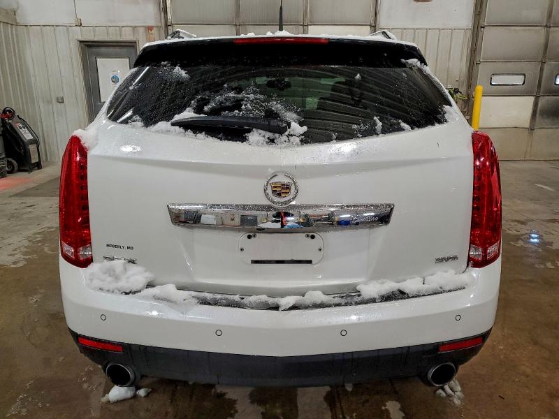Photo 6 from auction – 2013 CADILLAC SRX PERFOR with VIN 3GYFNDE31DS649465